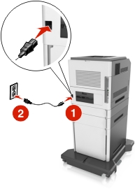 The power cord is plugged into the printer and into the electrical outlet.