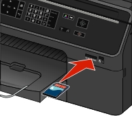 The illustration shows a memory card being inserted into the card slot.